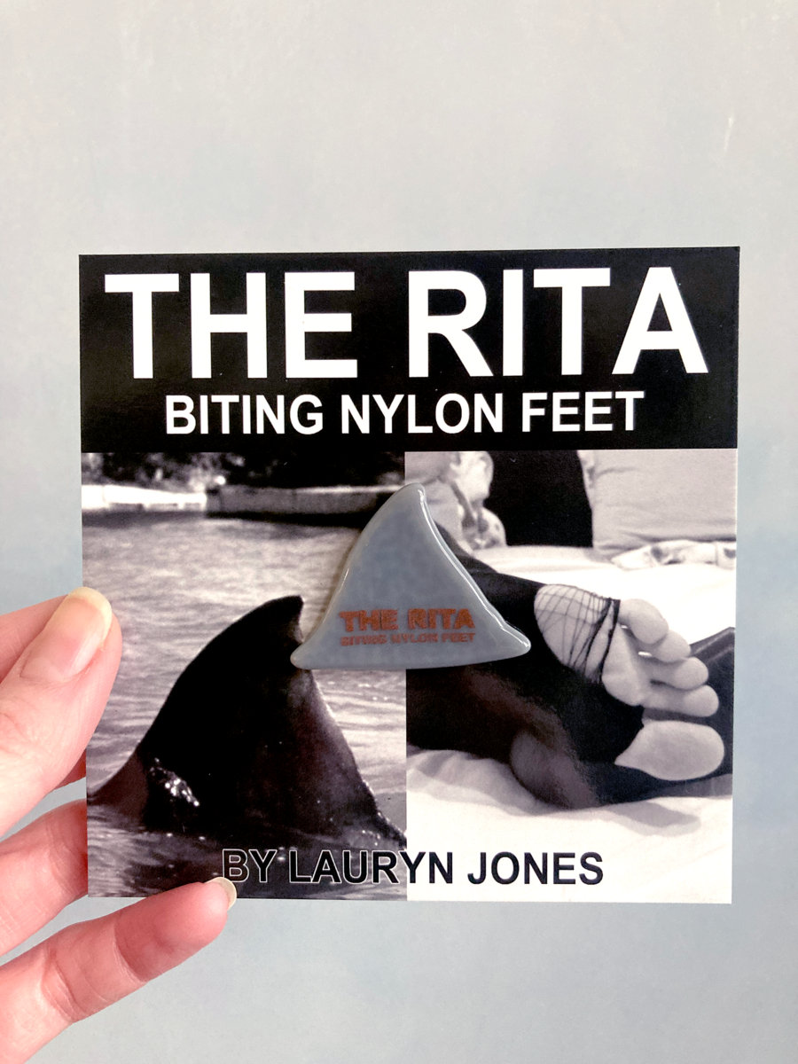 BITING NYLON FEET cover